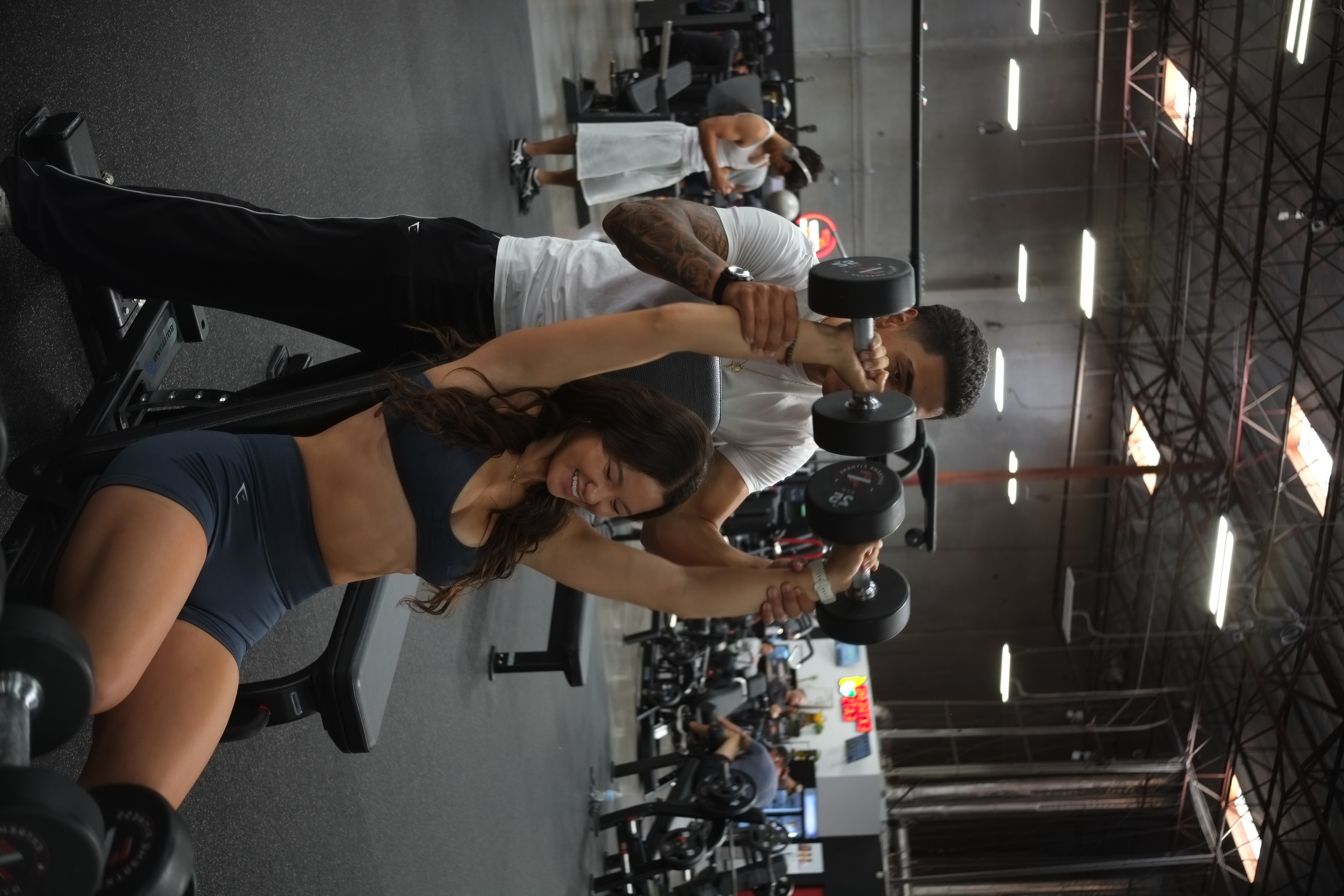 Coach cueing a client mid-set